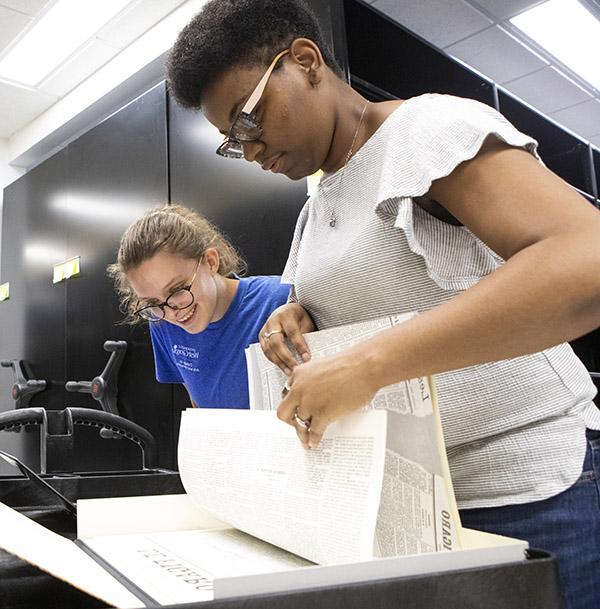 students looking at papers in Atlanta History Center